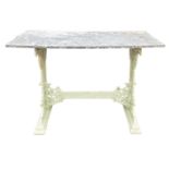A Victorian cast iron and later painted conservatory table, with a rectangular stone slab top,