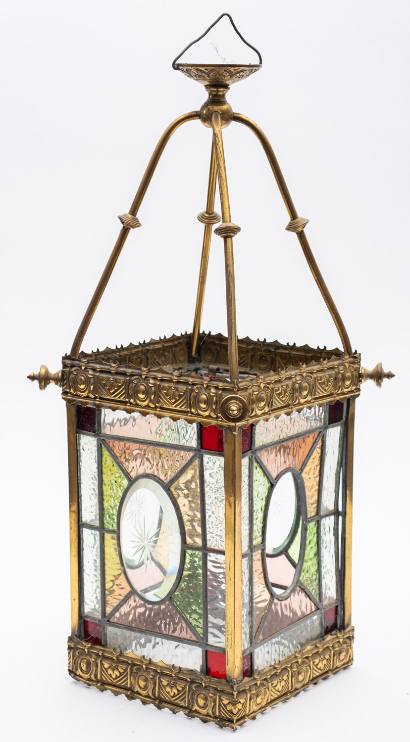 A late Victorian brass and leaded stained glass hall lantern,