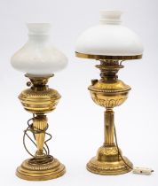 A late Victorian brass oil lamp with white opaque glass shade,