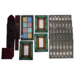 A collection of various leaded glass panels and six ruby tinted glass 'Gothic' pointed arch panel