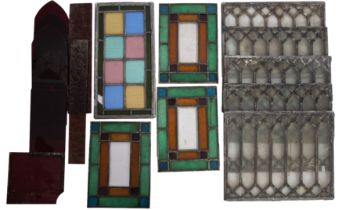 A collection of various leaded glass panels and six ruby tinted glass 'Gothic' pointed arch panel