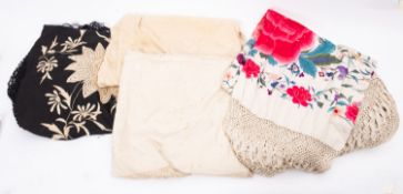 A Victorian cream silk and floral embroidered shawl,