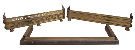 Two similar brass fenders, mid 19th century; both of rectangular form,