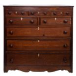A George IV North country oak and banded rectangular chest,