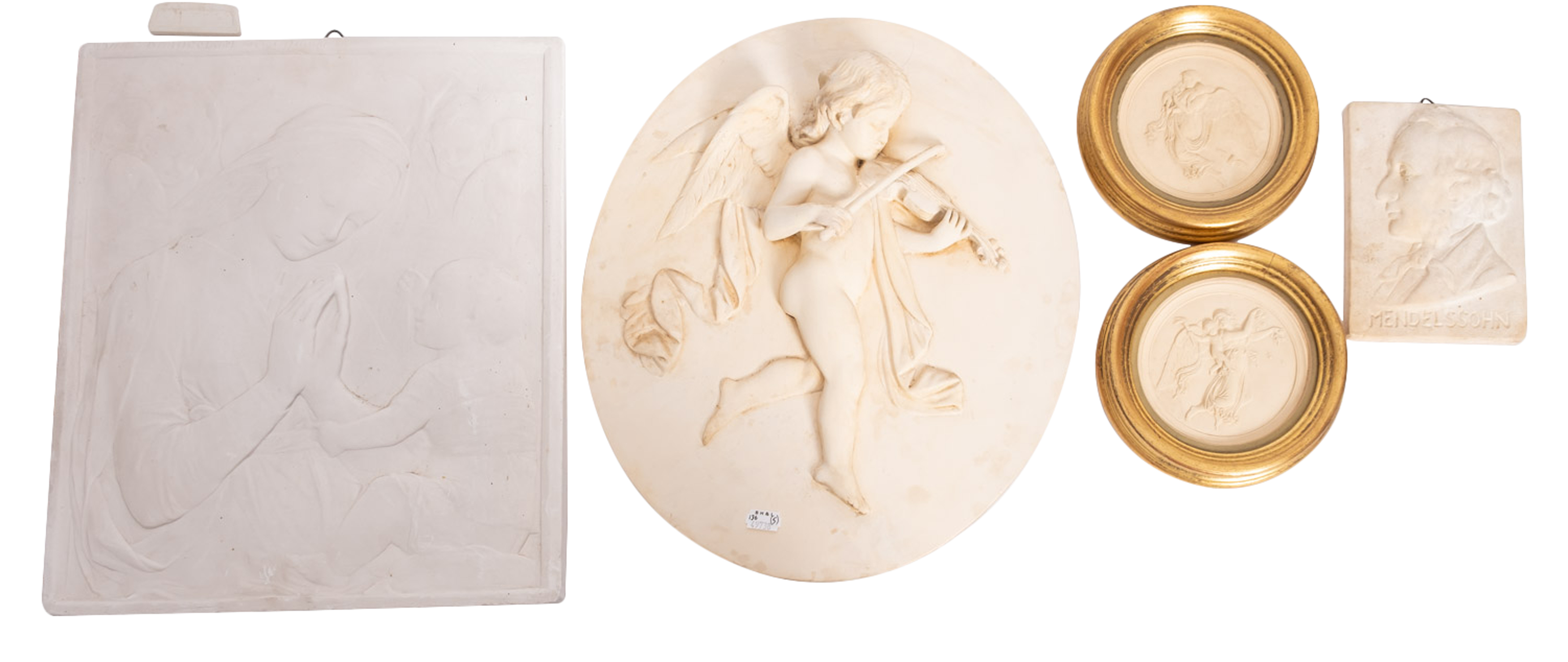 In the manner of Donatello, a plaster figural relief of the Virgin and Child, by Brucciani & Co,