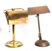 Two adjustable brass desk lamps, early 20th century; both with rectangular domed shades,