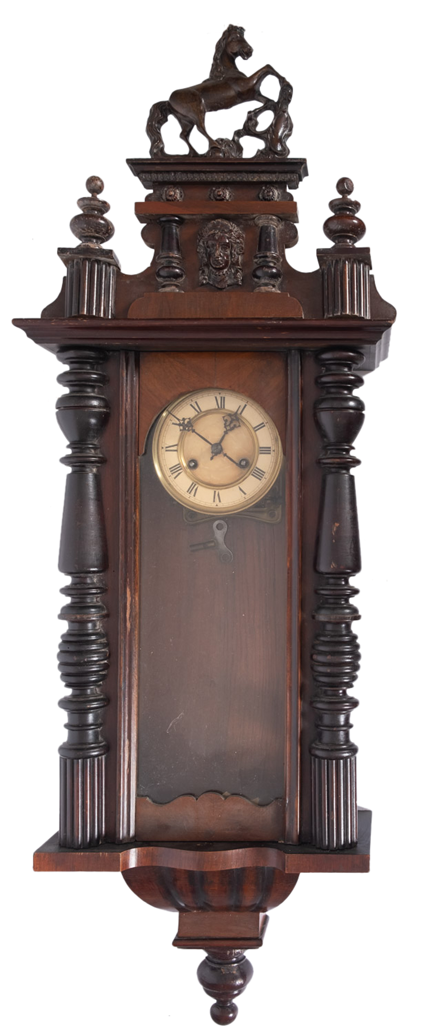 A late Victorian stained walnut wall clock, surmounted by a prancing horse with mask and urn finial,