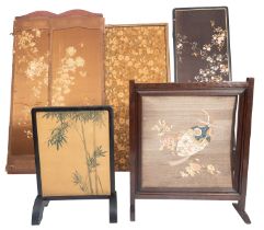 An Edwardian oak firescreen with Japanese silkwork panel of a tied egg and blossoming flowers,