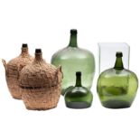 A green glass seal bottle, '25', 50cm high,a pair of oval wicker bound glass flasks,