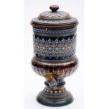 A Doulton Lambeth stoneware water purifier and cover of urn shape decorated with paterae and