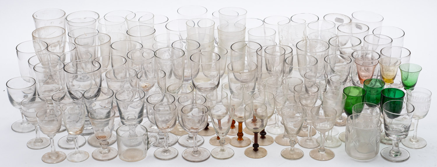 A collection of 19th century and later drinking glasses, including rummers,