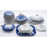 A quantity of various blue and white tablewares including oval meat dishes, tureens etc.