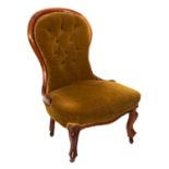 A lady's Victorian walnut nursing chair,