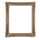 A gilded composite frame within a glazed display case - rebate 38 x 30.