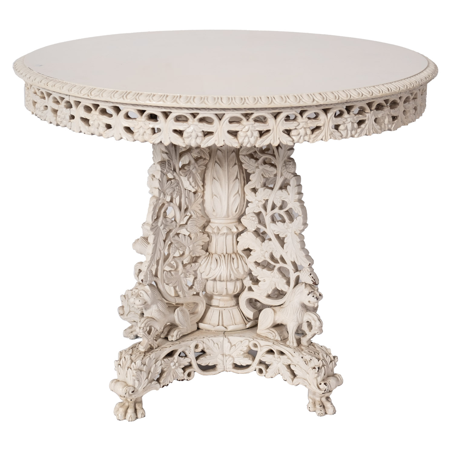An Anglo Indian carved hardwood circular centre table, circa 1900 and later painted,