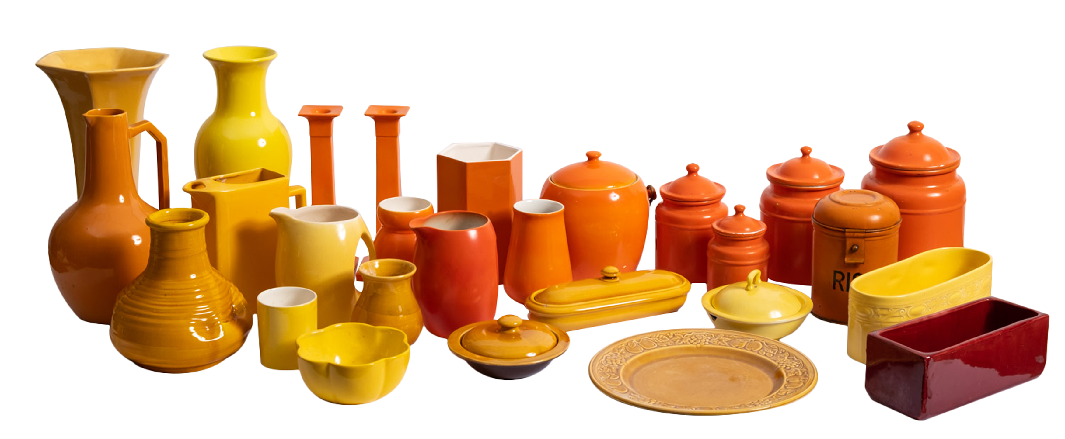 A collection of brightly coloured orange and yellow glazed ceramicwares including a pair of