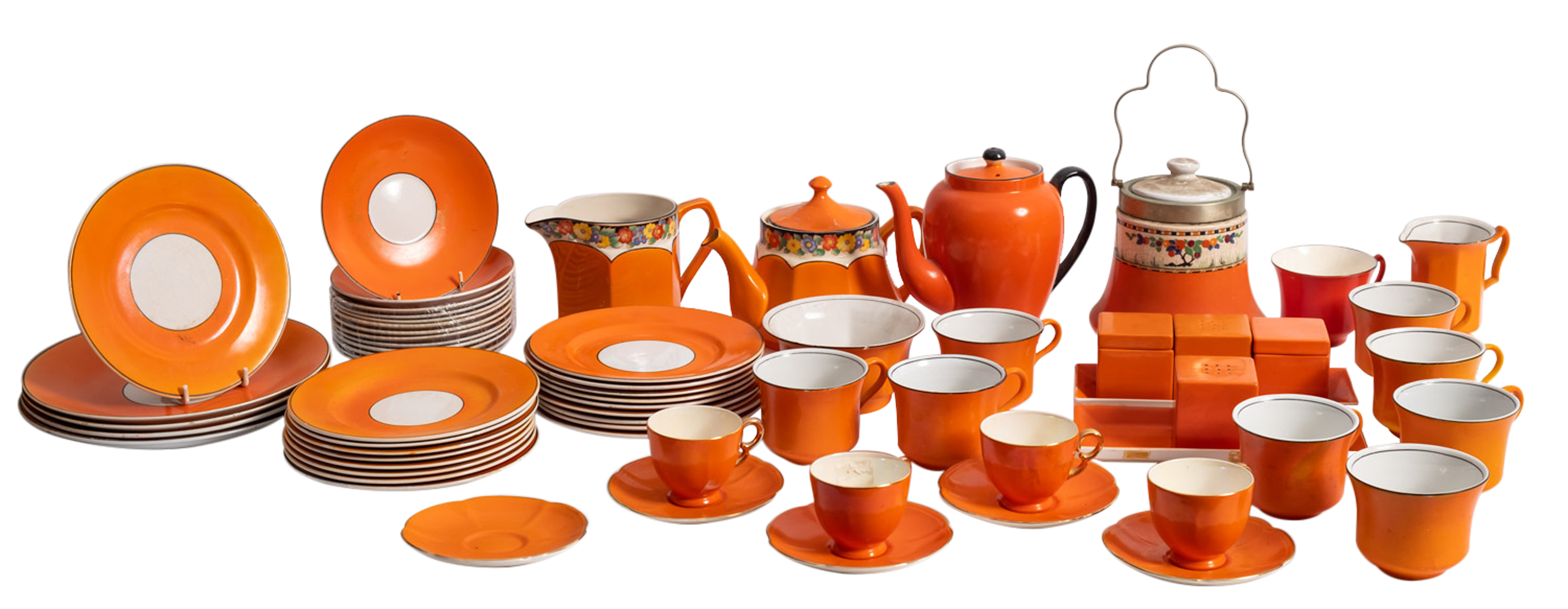 A quantity of Staffordshire pottery orange glazed teawares.