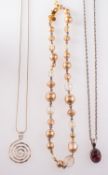 Three dress necklaces, to include a silv