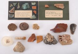 Fossils and geological specimens; a piece of banded agate, a pale amethyst quartz,