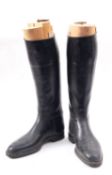 Maxwell of London. A pair of black leather riding boots with trees, 30cm heel to toe.