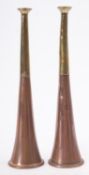 Two copper and brass hunting horns, not marked, 22.