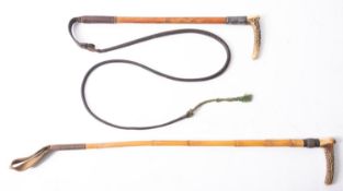 Two silver mounted riding crops with antler horn handles,
