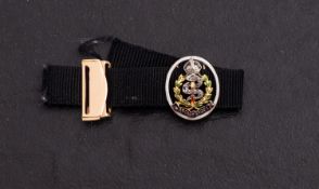 An enamelled Royal Army Medical Corps sweetheart brooch set with small rose-cut diamonds,