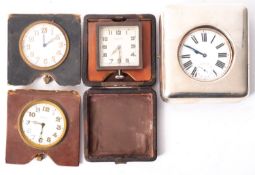 A silver plated Goliath pocket watch in a silver mounted travel case,