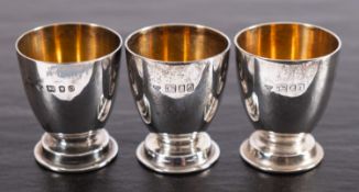 Three silver eggcups maker Garrard and Co.