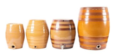 A large salt glaze earthenware storage barrel, stamped 'Dalton & Watts',