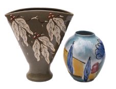 A Dartington Pottery white stoneware vase of oviform painted in colours with a simple landscape,