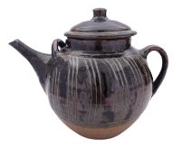 Attributed to Winchcombe, a large stoneware teapot with grooved strap and lug handles,