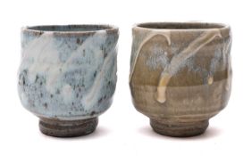 Takeshi Yasuda [b. 1943] two stoneware yunomi decorated with slip trails and ash glazes,