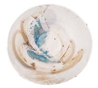 Kyra Cane [b. 1962] a large stoneware charger of circular form under arbitrary soda glazes