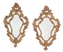 A pair of Italian carved and giltwood framed marginal wall mirrors, in 18th century style,