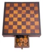 A Victorian lacquered papier mache hinged chess or draughts board,