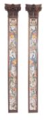 A pair of Delft tile inset carved and stained hardwood pilasters,