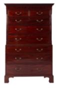 A George III mahogany chest on chest, the upper part with a moulded dentil cornice,