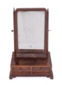 A George III mahogany and inlaid swing frame platform toilet mirror,