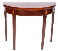 A George III mahogany and inlaid half round card table, bordered with boxwood and ebony lines,