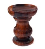 An 18th Century lignum vitae pounce pot, with circular dished top,