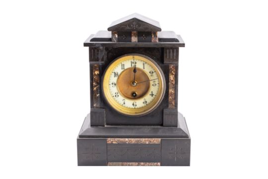 A French Victorian black marble mantel clock having an eight-day duration timepiece movement,