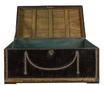A Regency period brass bound black leather trunk inscribed 'P Bingham', with studded decoration,
