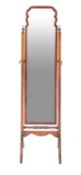 A walnut cheval mirror in Queen Anne taste,