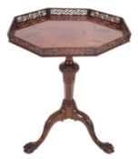 A carved mahogany occasional table in George III style,