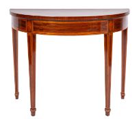 A George III mahogany and satinwood banded demi-lune card table, late 18th century; with hinged top,