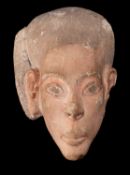 An Egyptian sculpted alabaster head, probably later second millennium B.C.