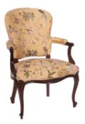 A 19th Century carved mahogany open armchair,