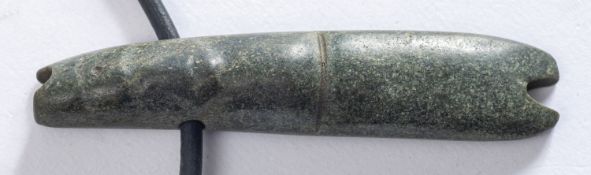 A Pre-Columbian, Costa Rica, green/ grey tube pendant, on a modern leather thong, 7.