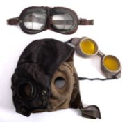 A WWII RAF' C' type leather flying helmet together with a pair of yellow tinted goggles and a pair